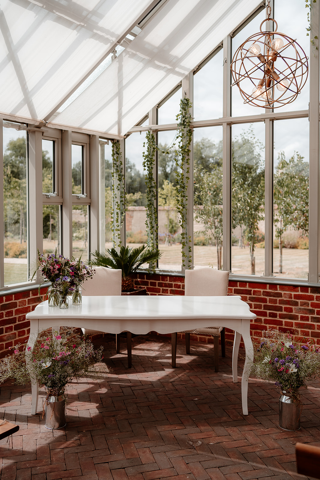 Summer wedding at Syrencot - ceremony in the Glasshouse