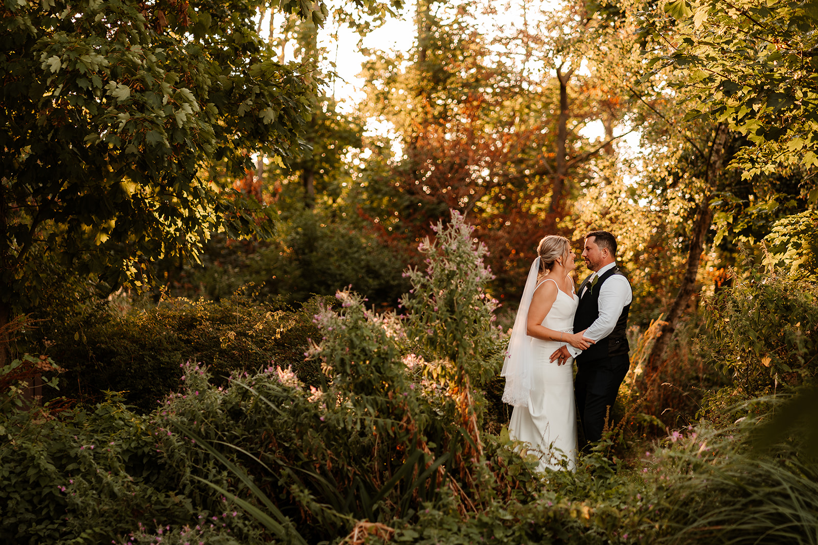 Golden hour couple photos in the gardens for an elegant Kingston Country Courtyard wedding