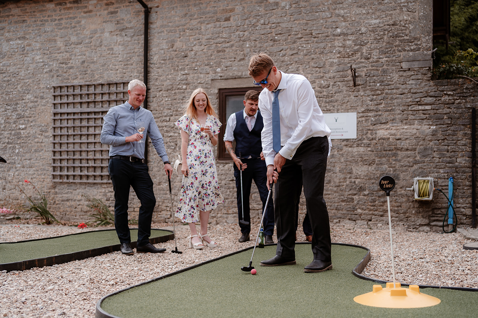 Wedding guests play crazy golf at Kingston Country Courtyard