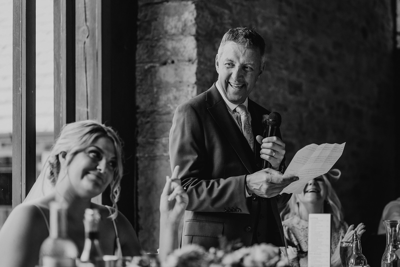 Speeches in the rustic barn for a Kingston Country Courtyard wedding