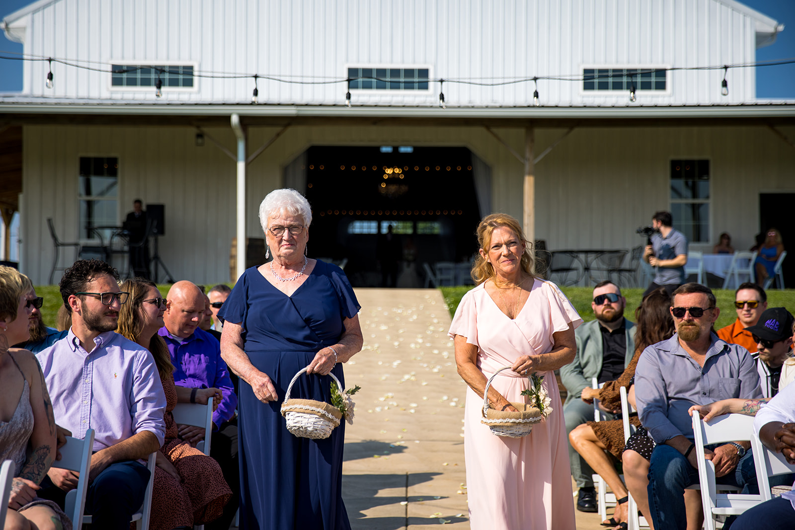 Grandma's as flower girls for outdoor wedding ceremony in Dry Ridge, Kentucky