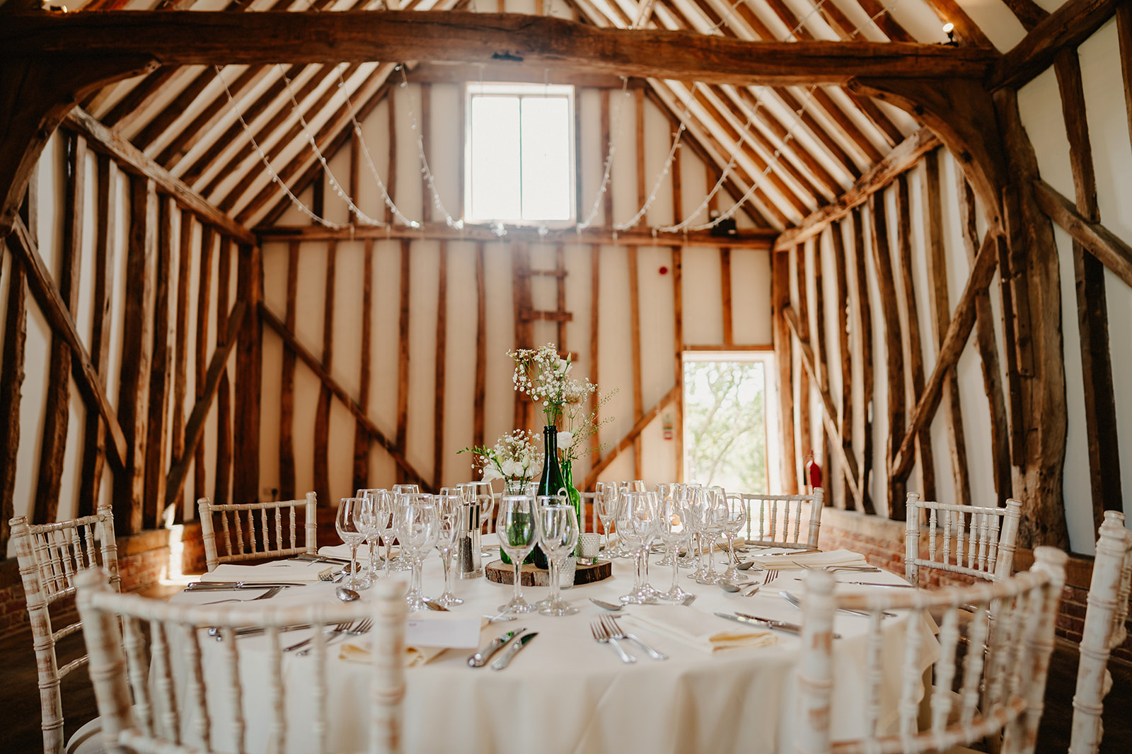 a wide photo of the wedding reception barn at villiers barn in essex