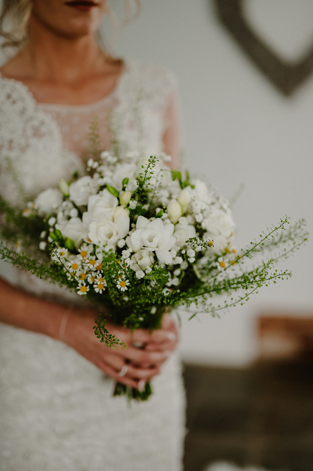 wedding flowers being held by bride