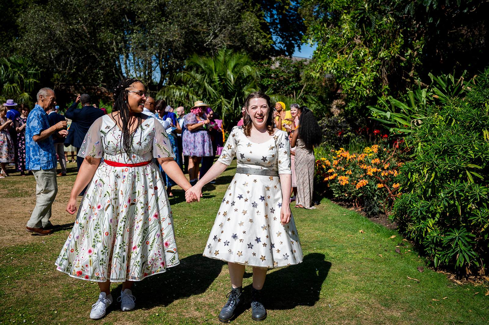 bubble confetti and two brides at Kew Gardens wedding
