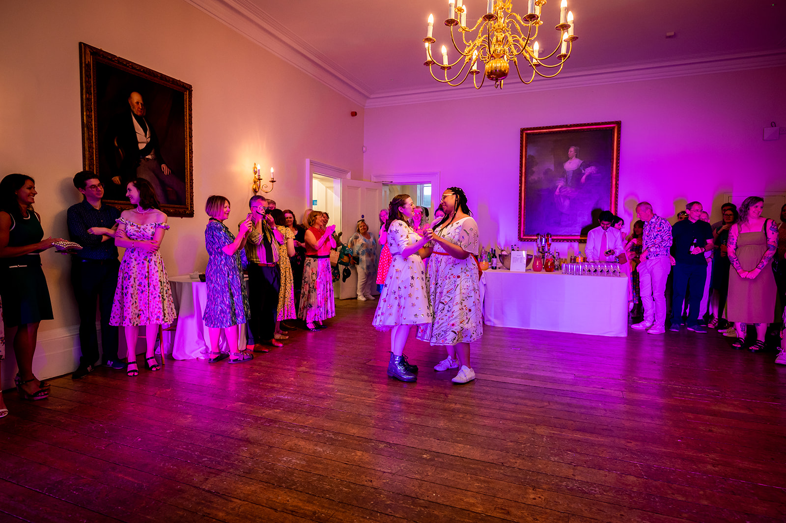two brides dancing during their wedding at Kew Gardens