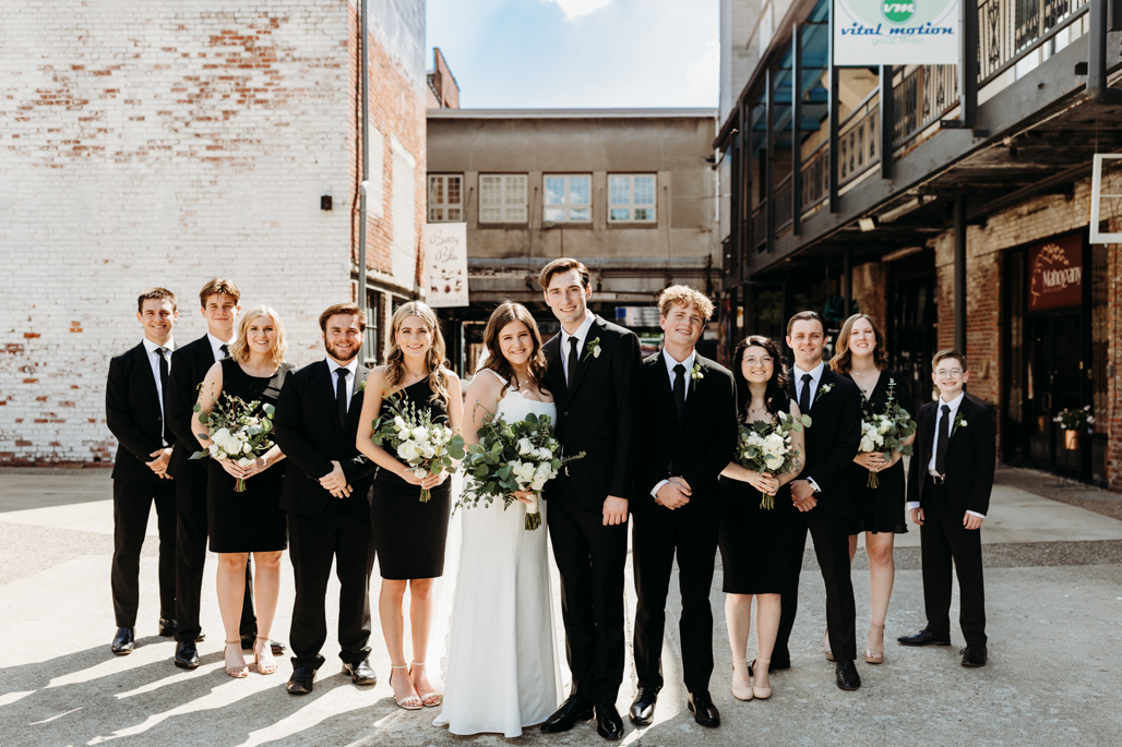 WEDDING PARTY POSES AT INDUSTRIAL MELLWOOD ART CENTER