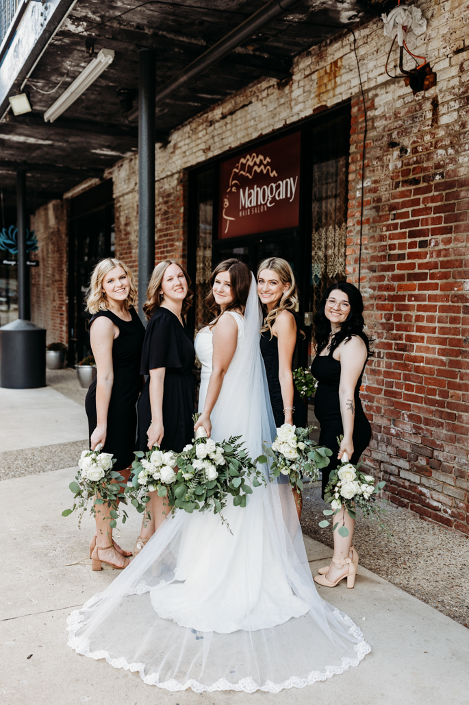 BRIDE AND BRIDESMAIDS WITH BEAUTIFUL BOUQUETS AT MELLWOOD ARTS CENTER