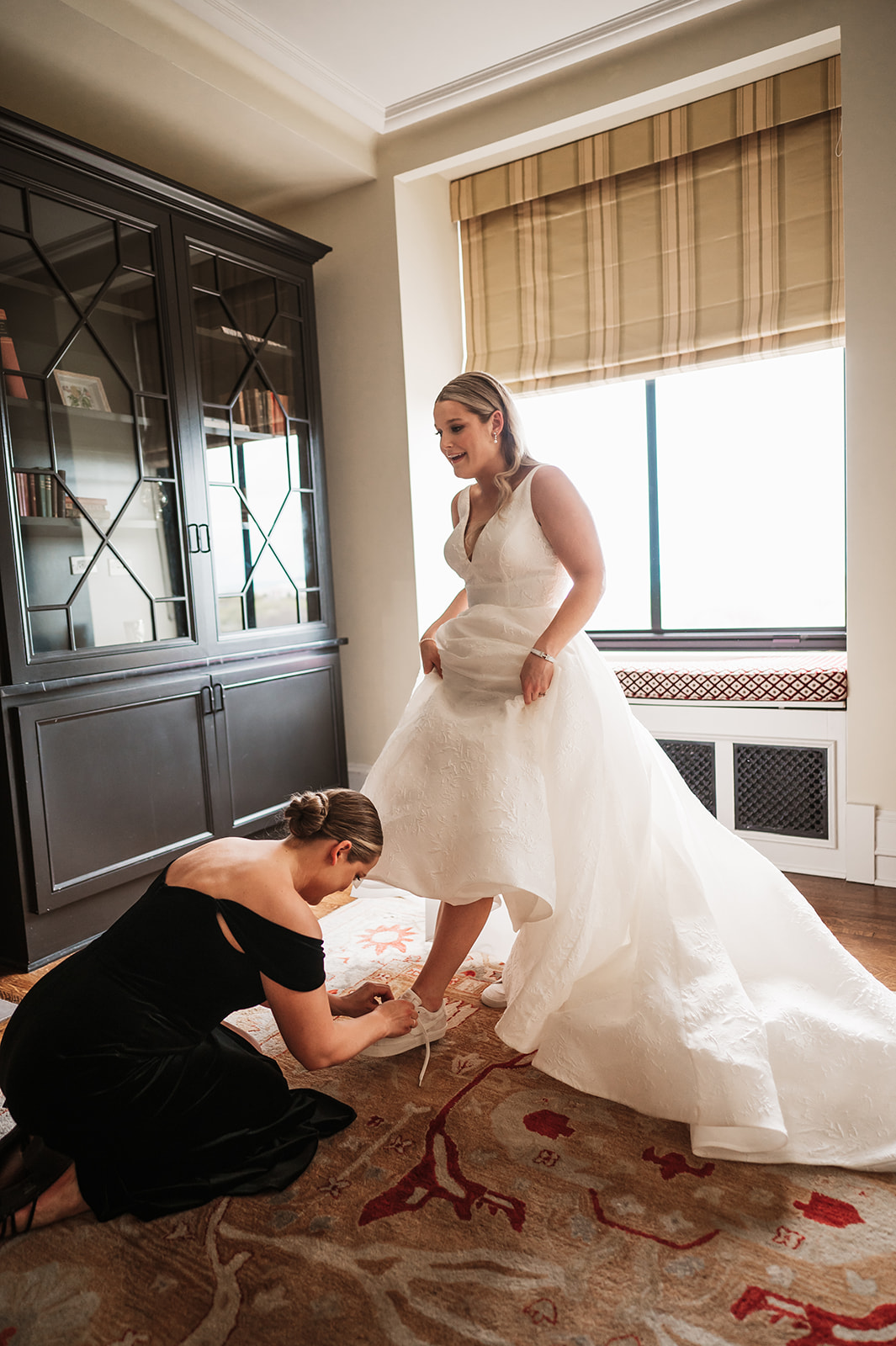 Blackstone Chicago Wedding Photography bride putting her shows on