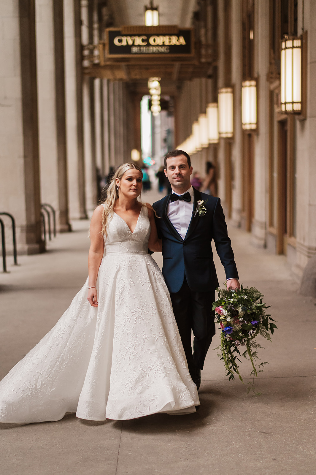 epic bride and groom wedding photos at the Lyric Opera Chicago.