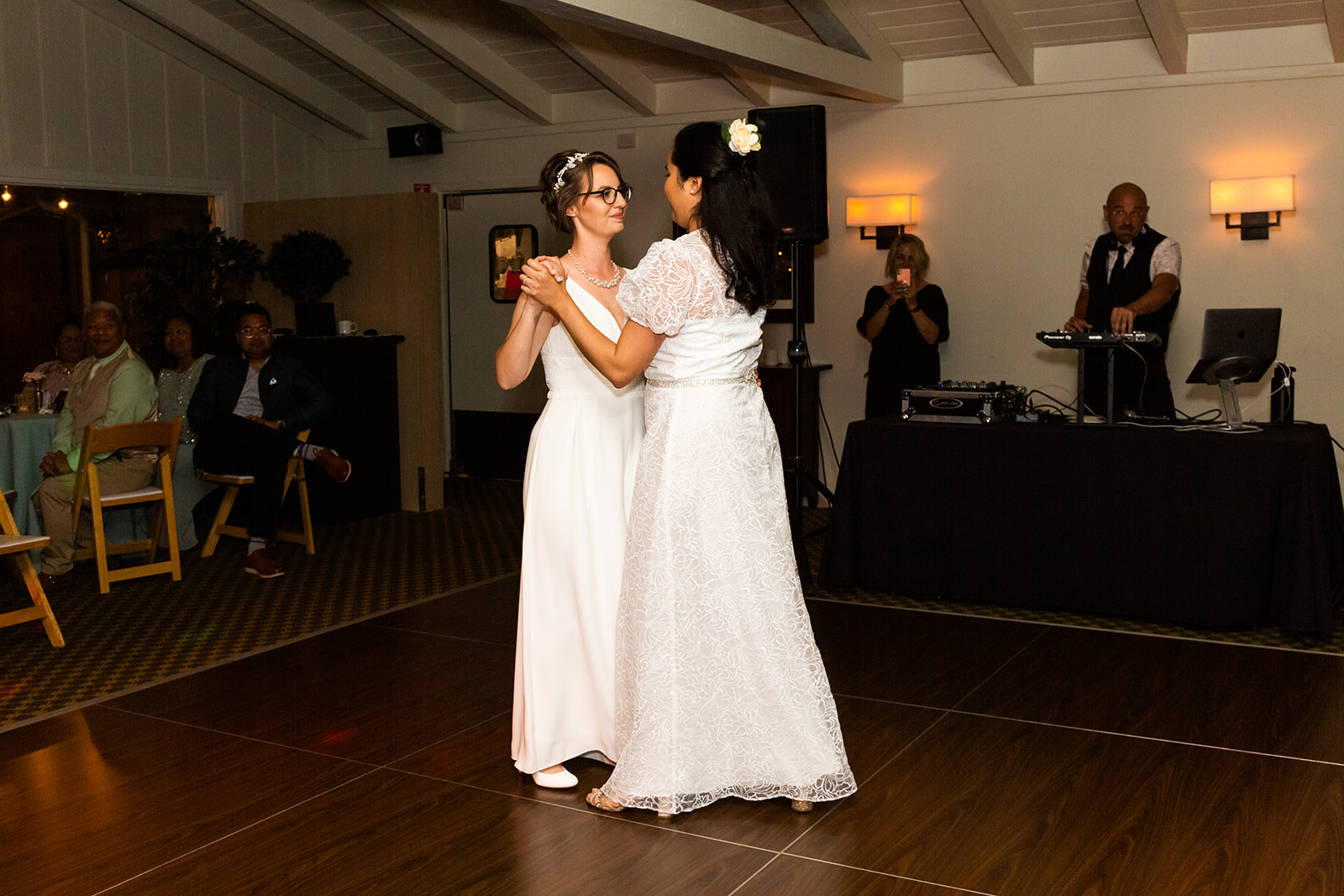 First dance with two brides in wedding dresses