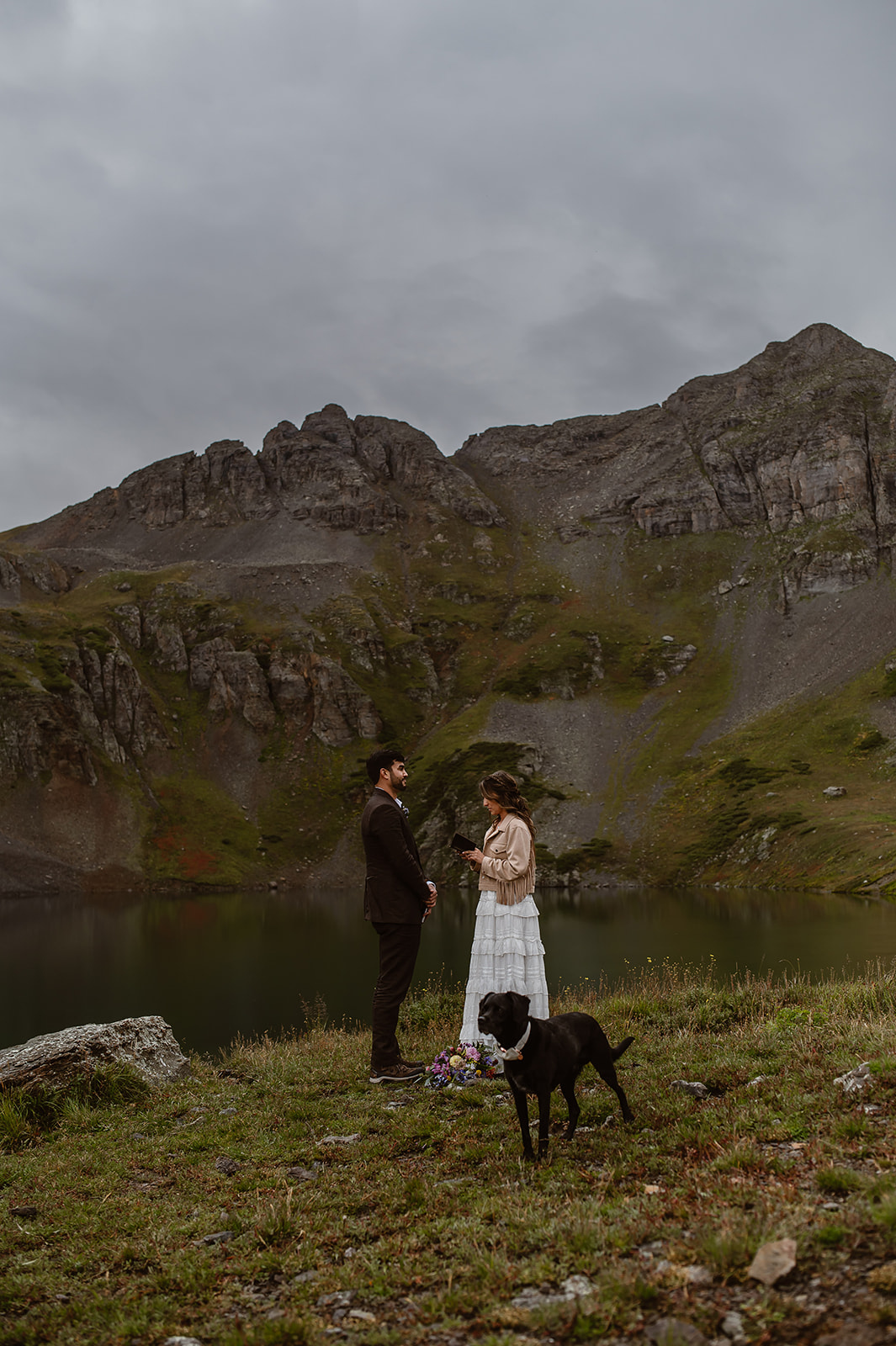 Clear Lake near Ouray Colorado. Couple saying their vows in front of a stunning Alpine lake for their adventure elopemen