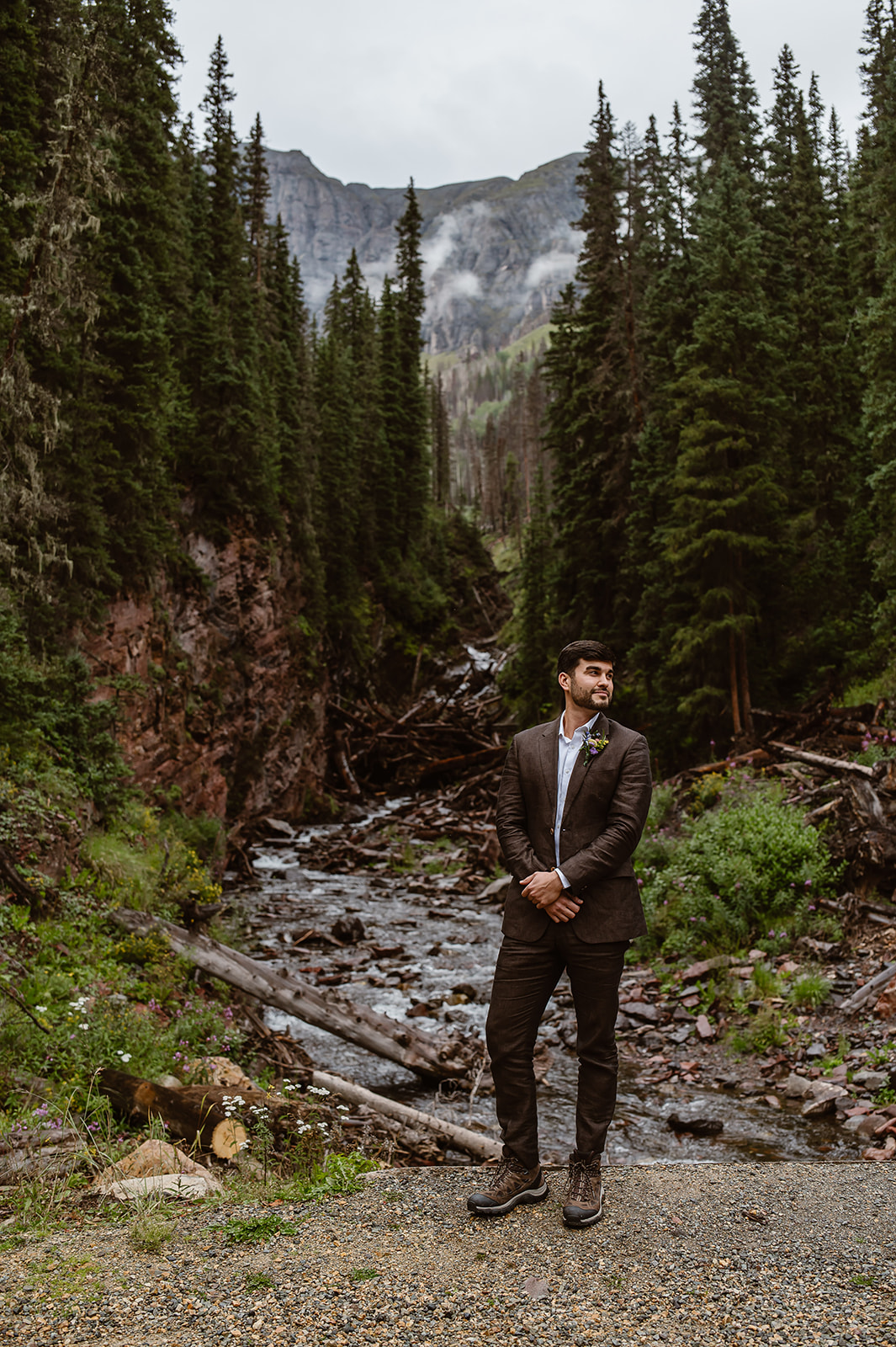 Groom in his brown tweed suit for his adventure elopement in Silverton Colorado. 