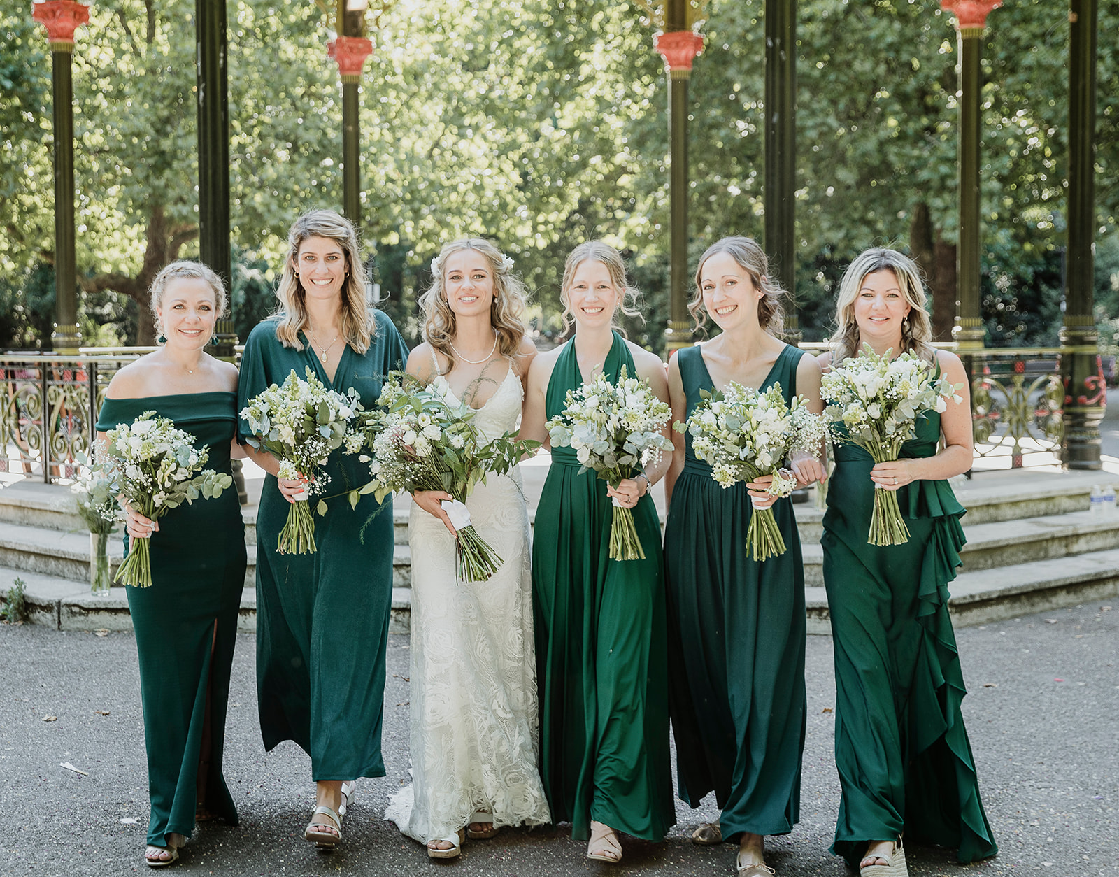 Bride photographed with her bridesmaids in Battersea Park