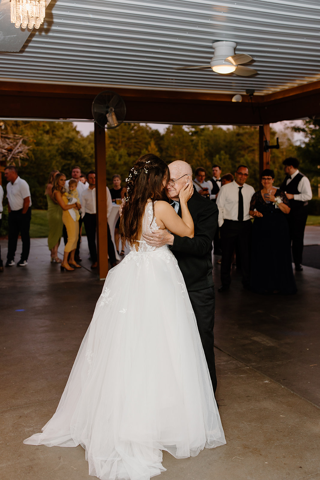 Bride and her grandfather share a dance