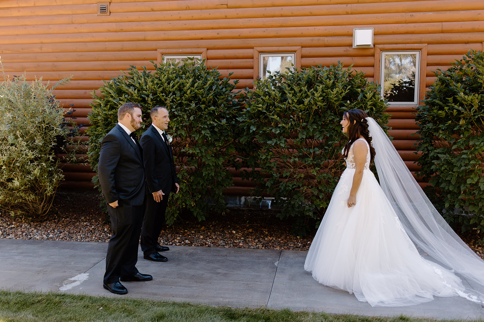 Bride approaches her father and brother