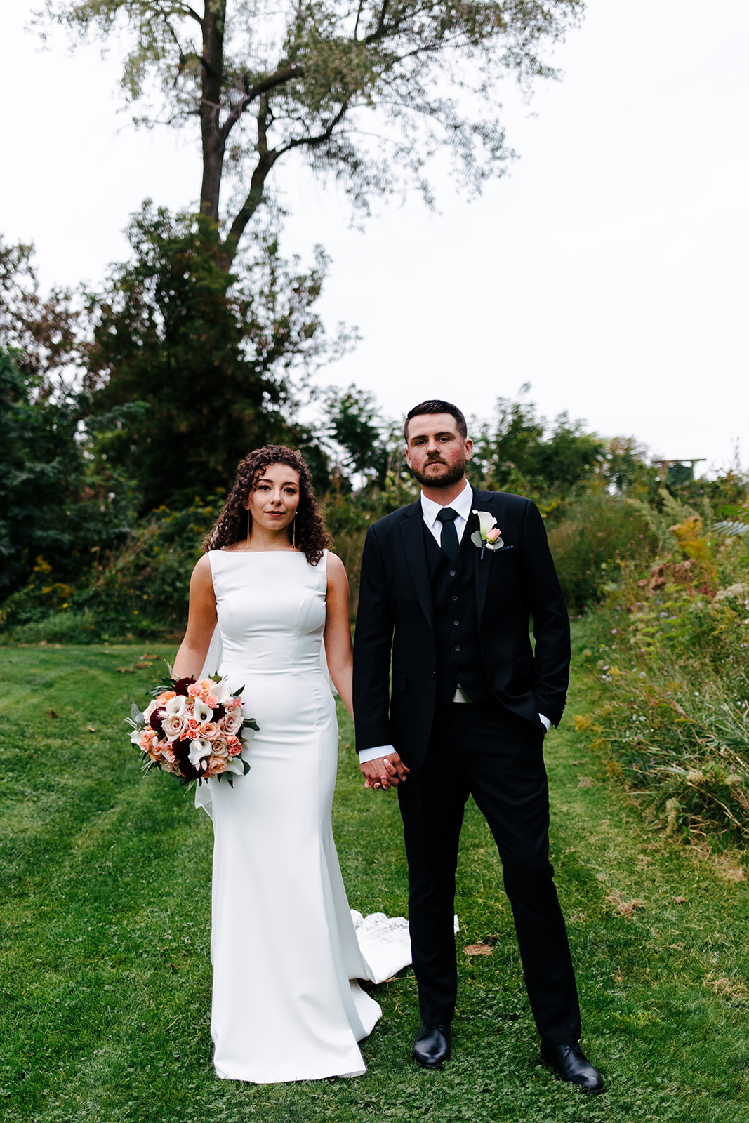 Bride and groom portrait on the golf course of Traditions in Syracuse, NY.