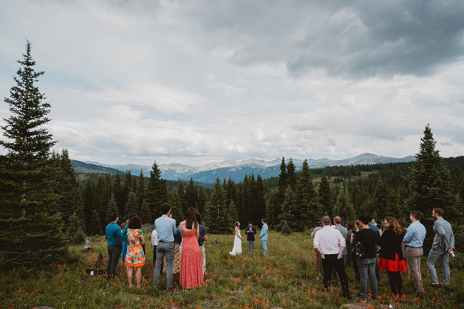 Shrine Pass Huts Summer Wedding, Frisco, CO. Ceremony in the wildflowers 