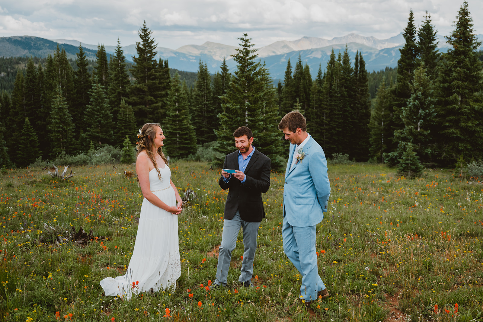Shrine Pass Huts Summer Wedding, Frisco, CO. Ceremony in the wildflowers 