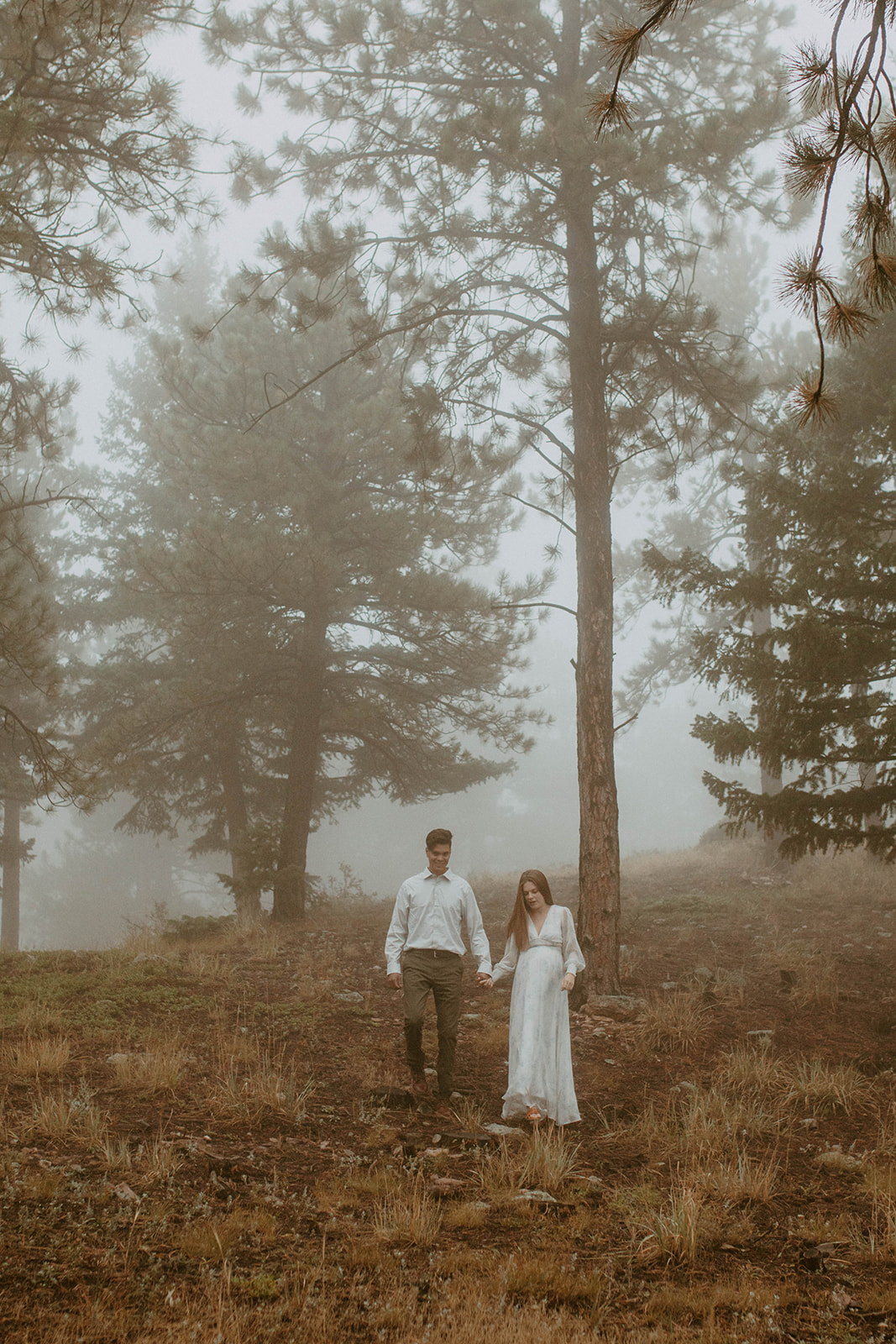 Couple in a misty forest