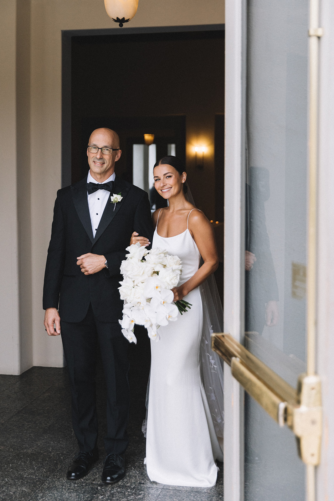 Bride gets ready to walk down the isle with her father at the Marbella Country Club in San Juan Capistrano, California. 