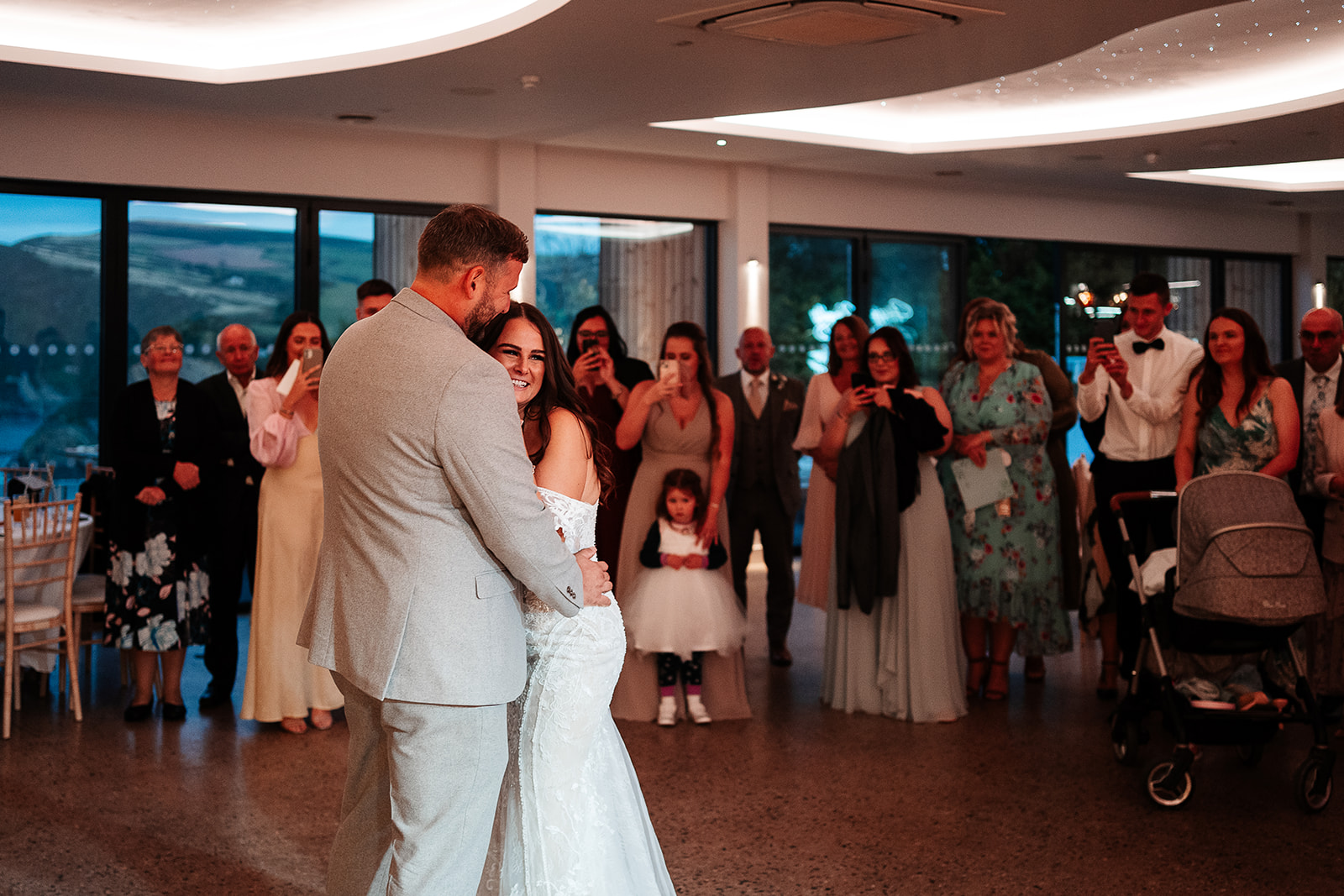 Newlywed couple share their first dance at their Sandy Cove Hotel wedding