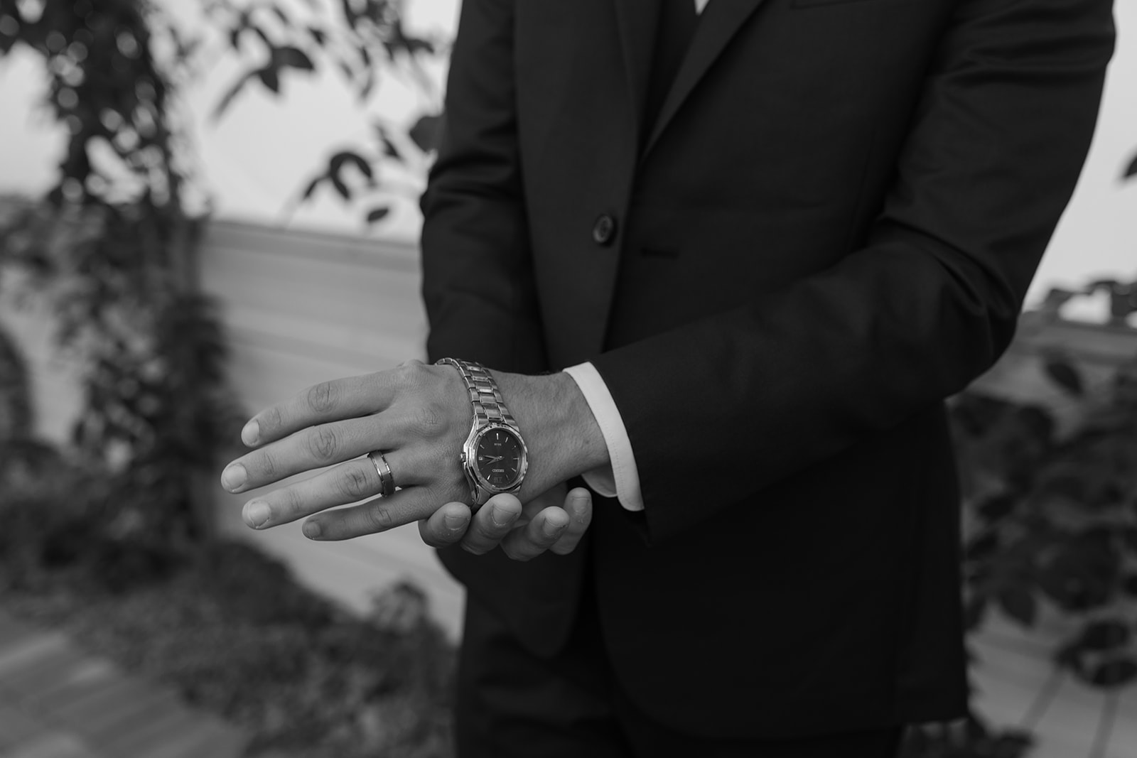 Groom puts on his watch