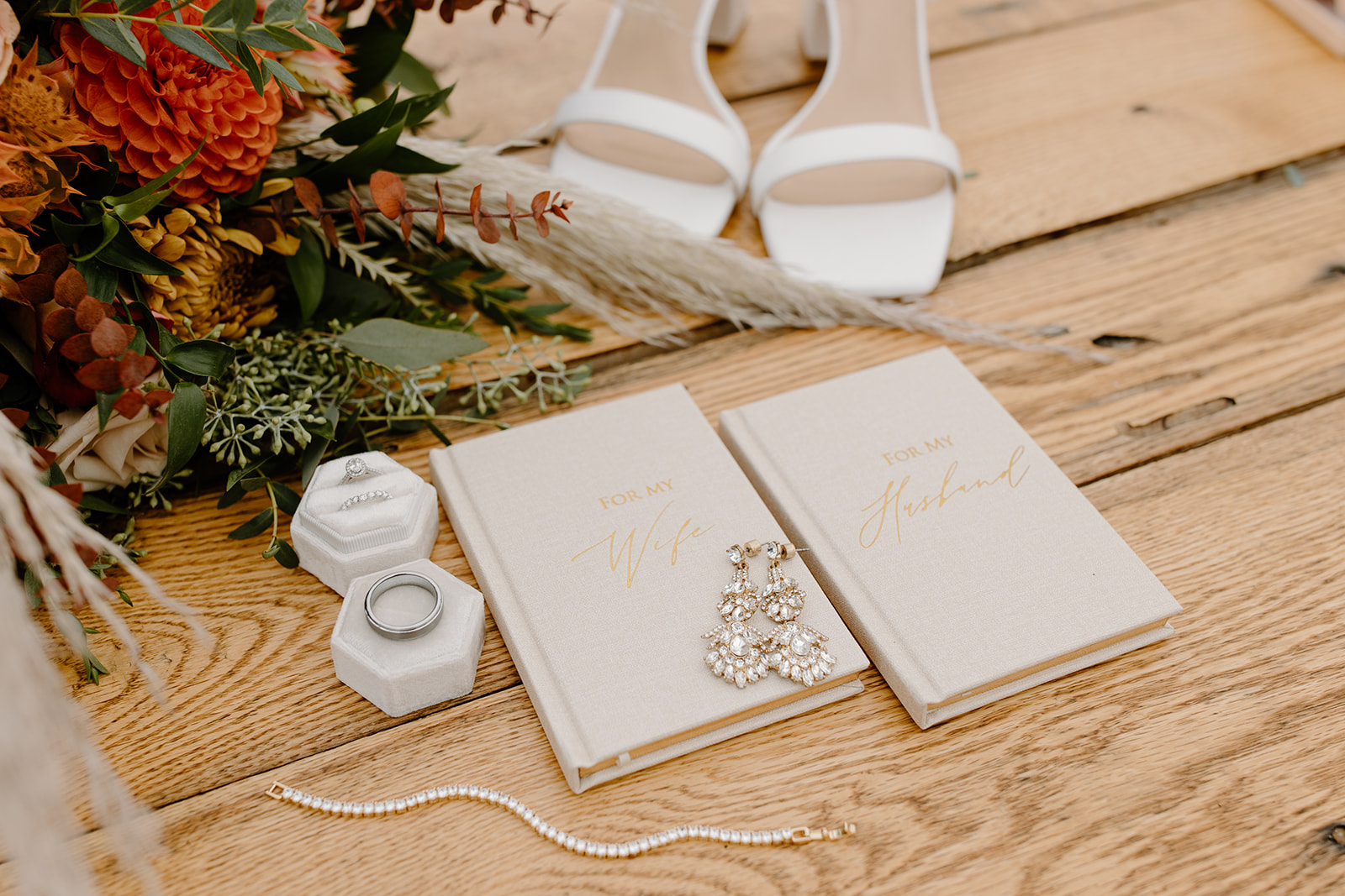 Vow books with wedding rings