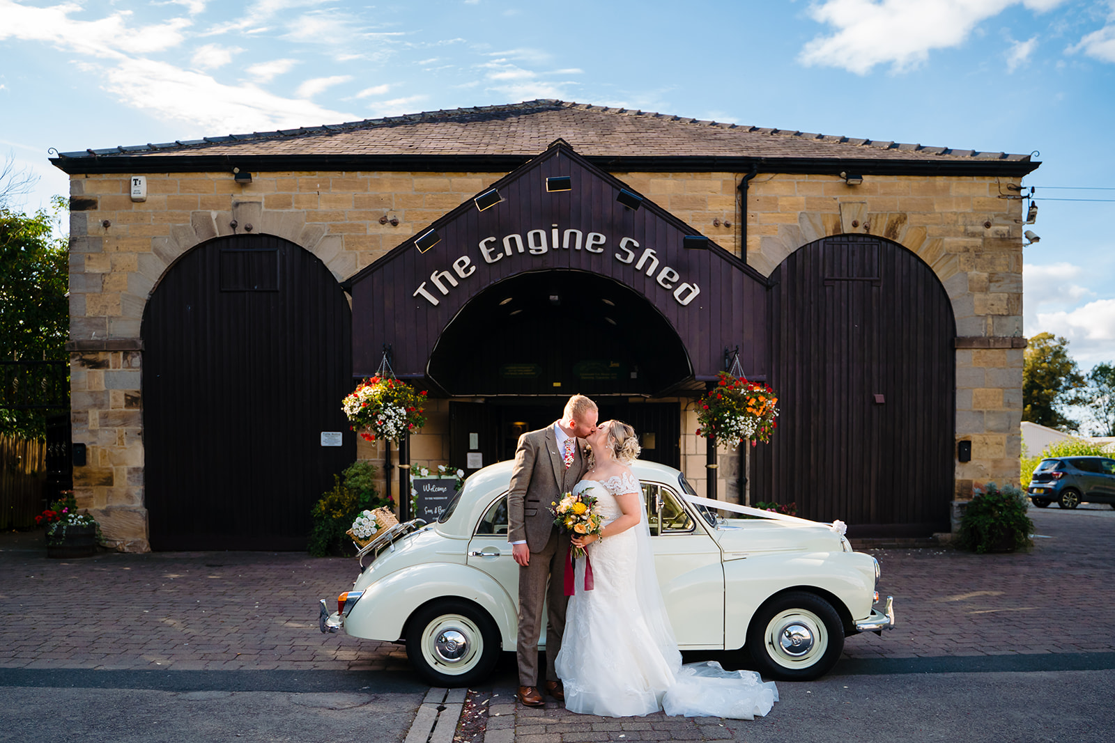 husband and wife outside the engine shed in wetherby