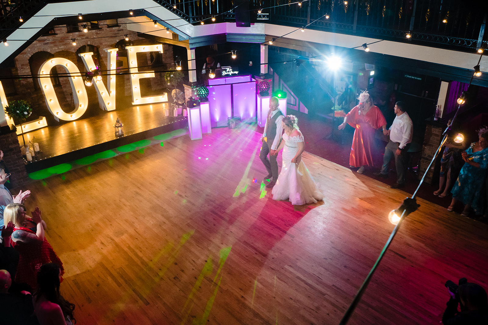 husband and wife first dance in the engine shed