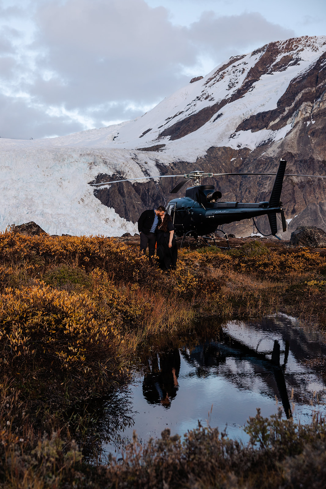 helicopter engagement photo session in the fall in alaska