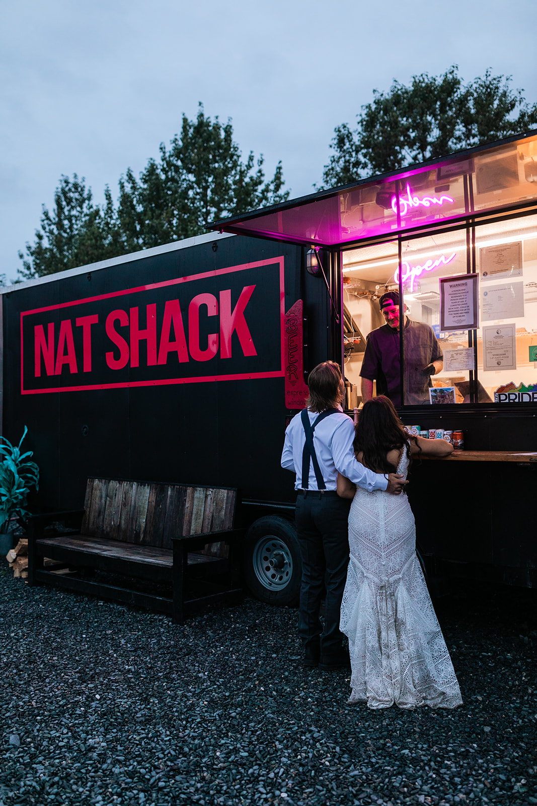 couple has a food truck for dinner on their wedding day in alaska