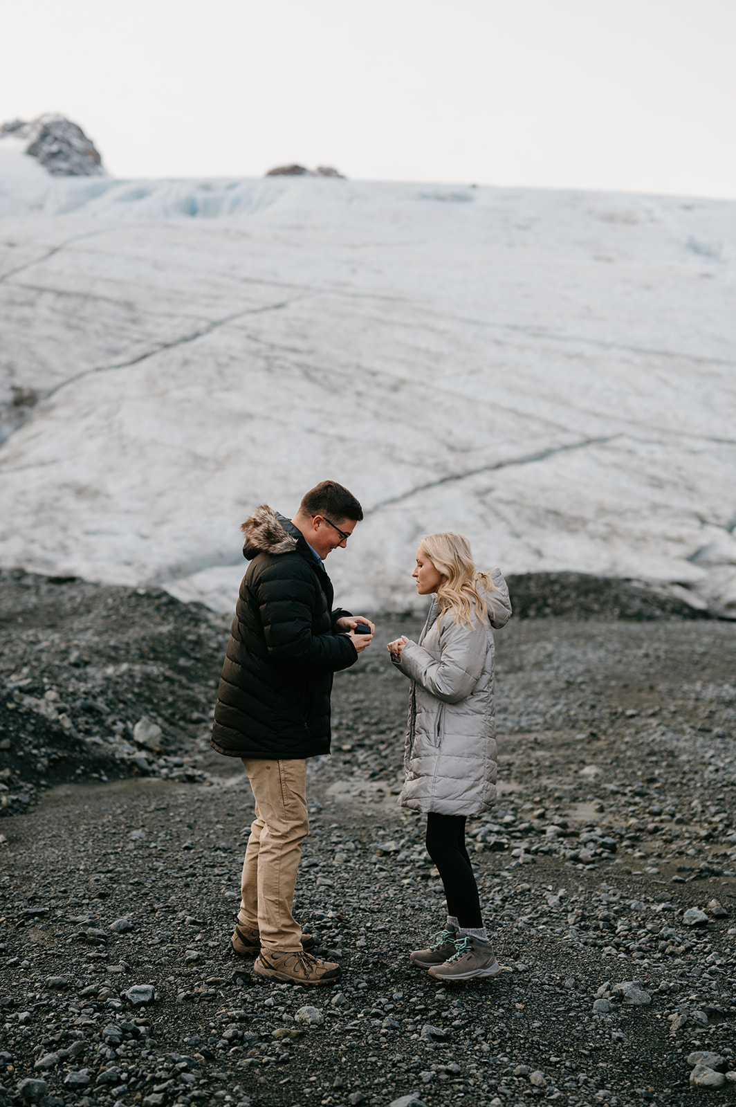 A couple proposed on a glacier in Alaska.