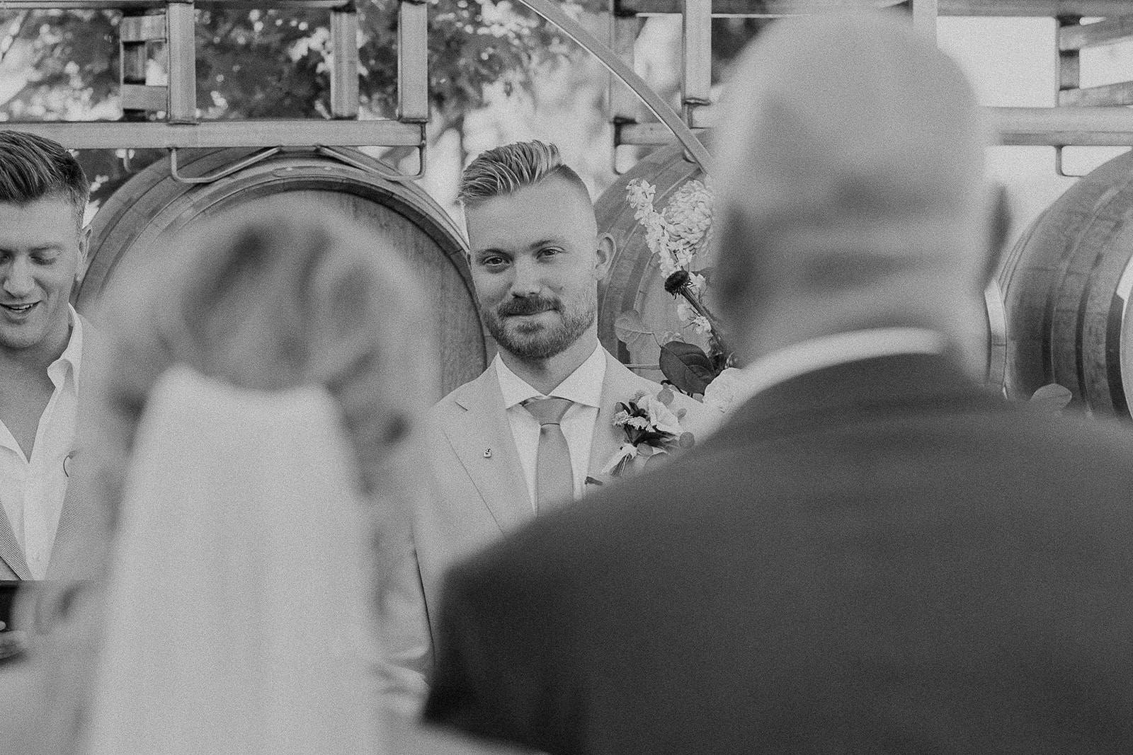Special moment of groom watching future bride walk down the aisle 