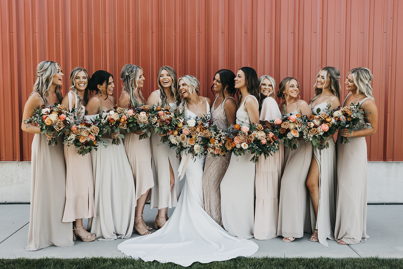 Bride and bridesmaids share a laugh for photos before the wedding at Copper Wine Company winery