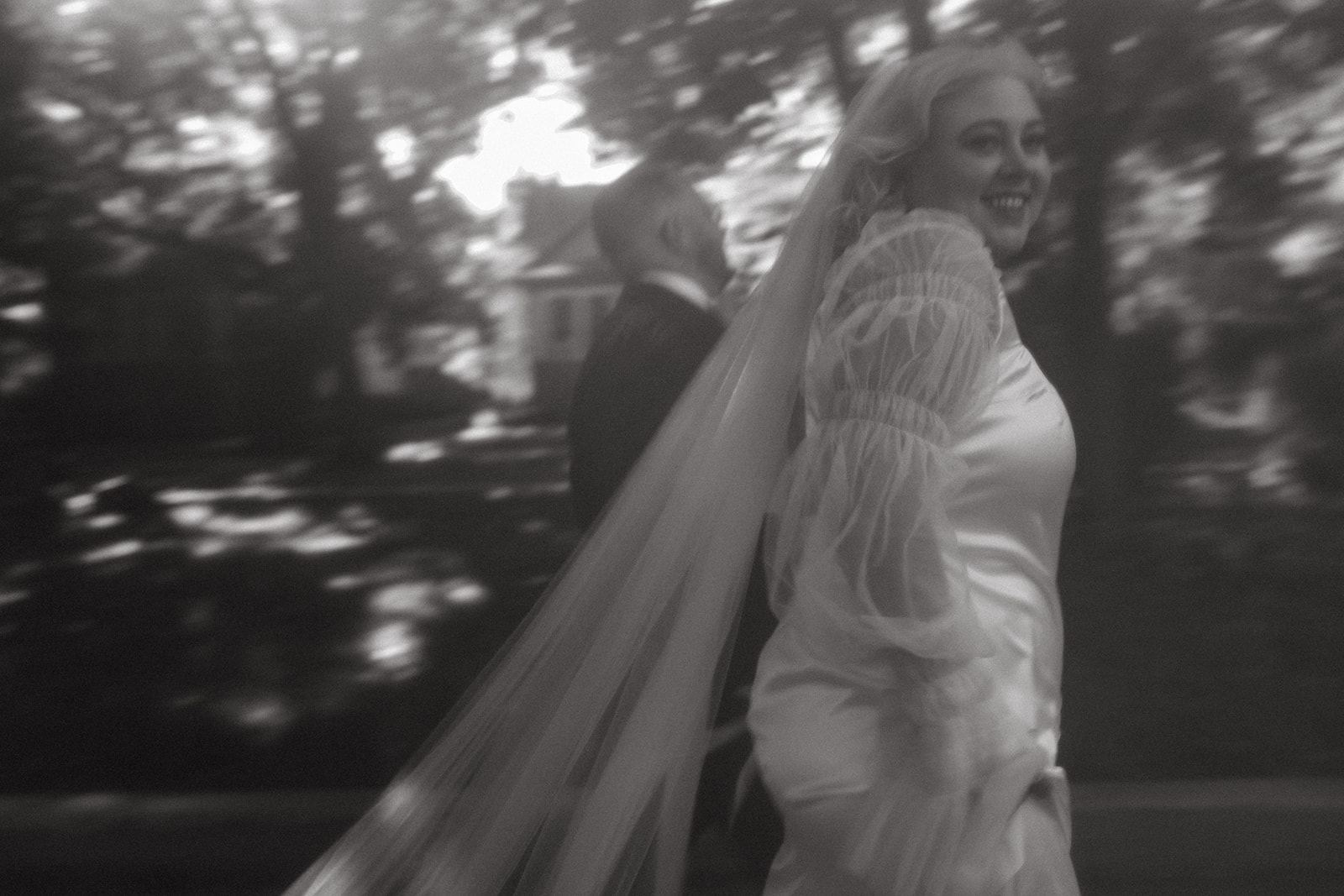 black white motion blur running wedding photo