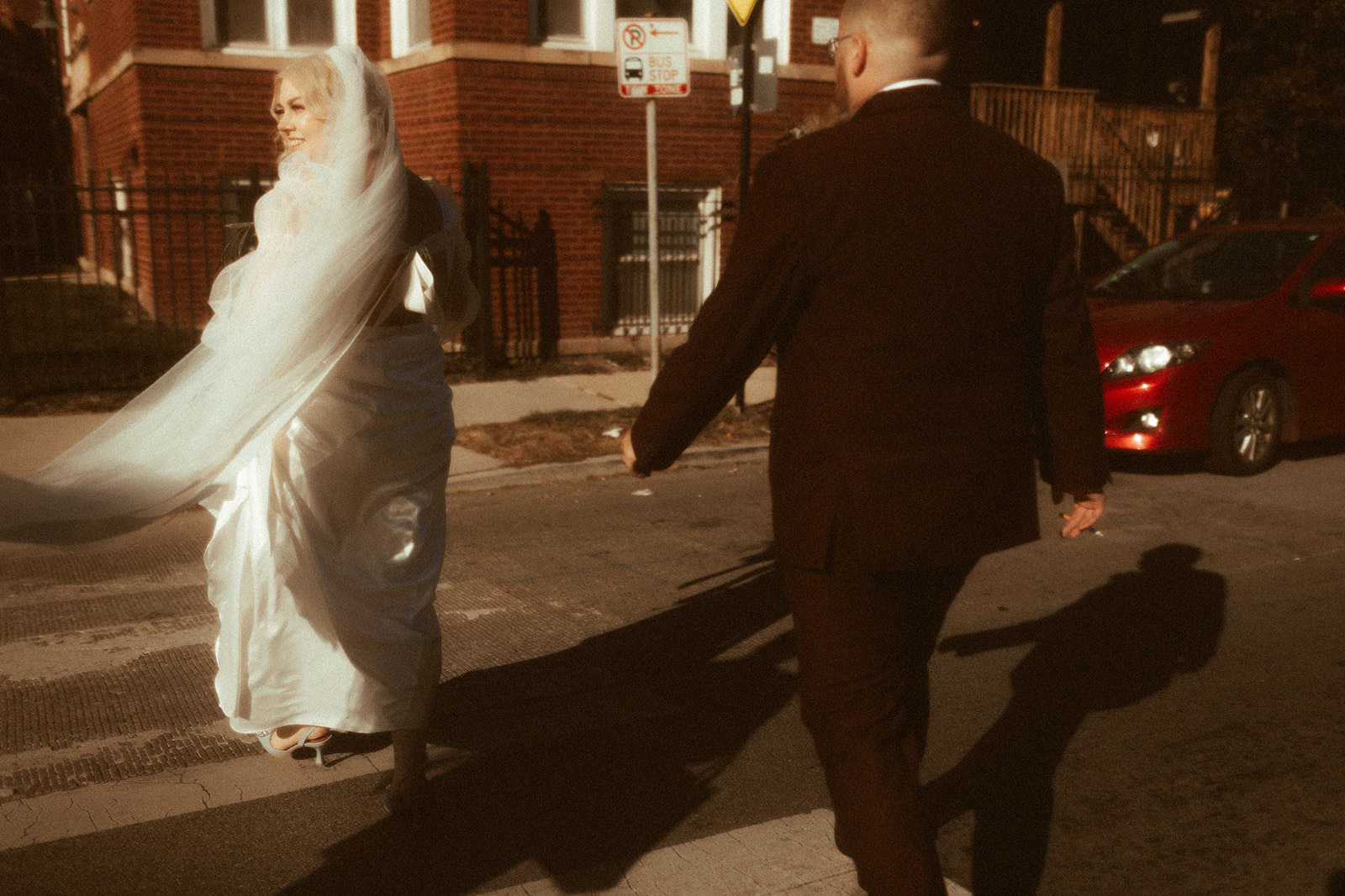 bride and groom walking for chicago elopement photos