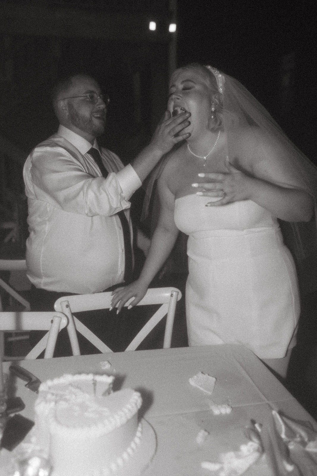 candid cake smash wedding photo