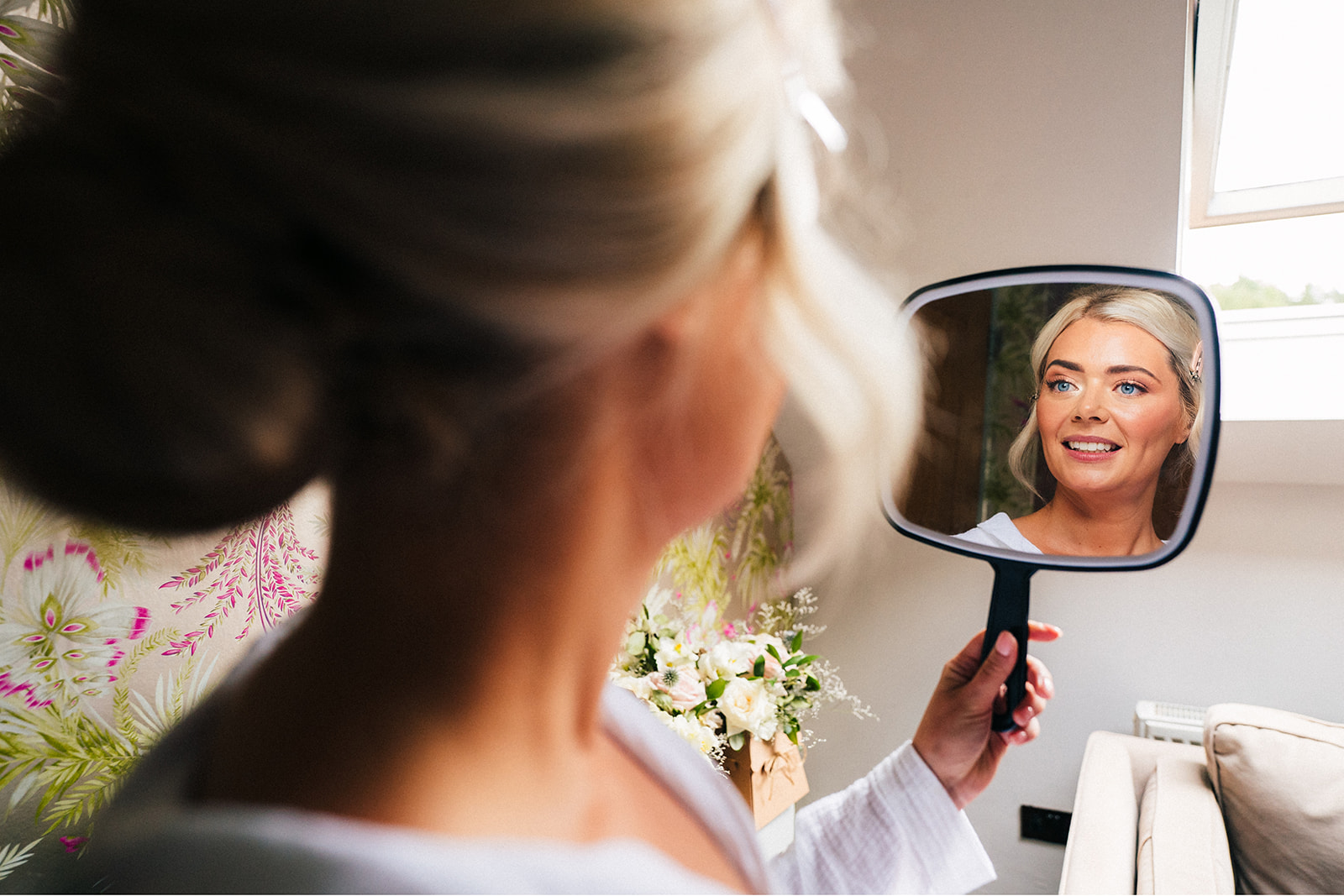 The Chequers Inn Wedding Photography - bride looking at herself in the mirror