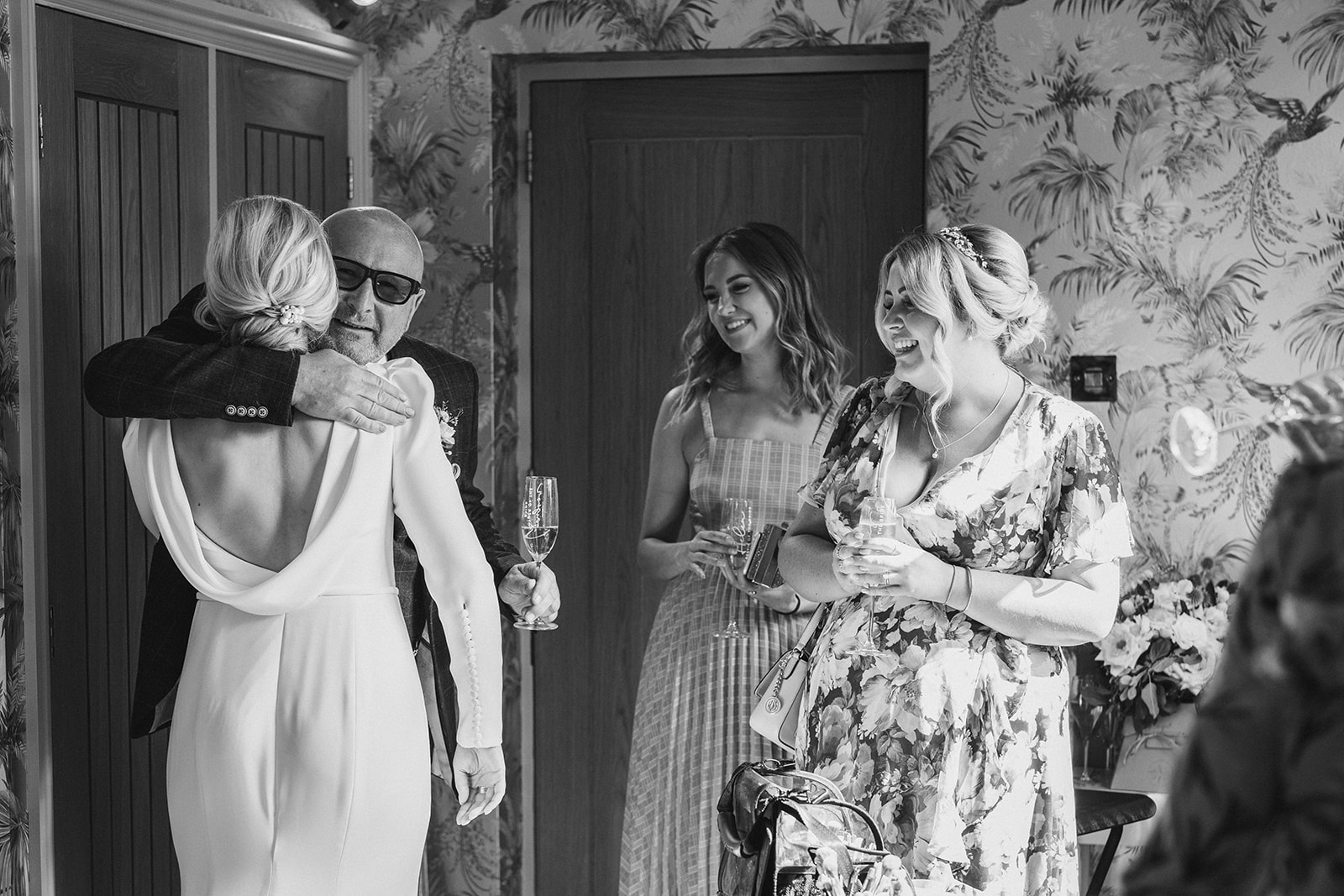 The Chequers Inn Wedding Photography - father of the bride, giving his daughter, a hug