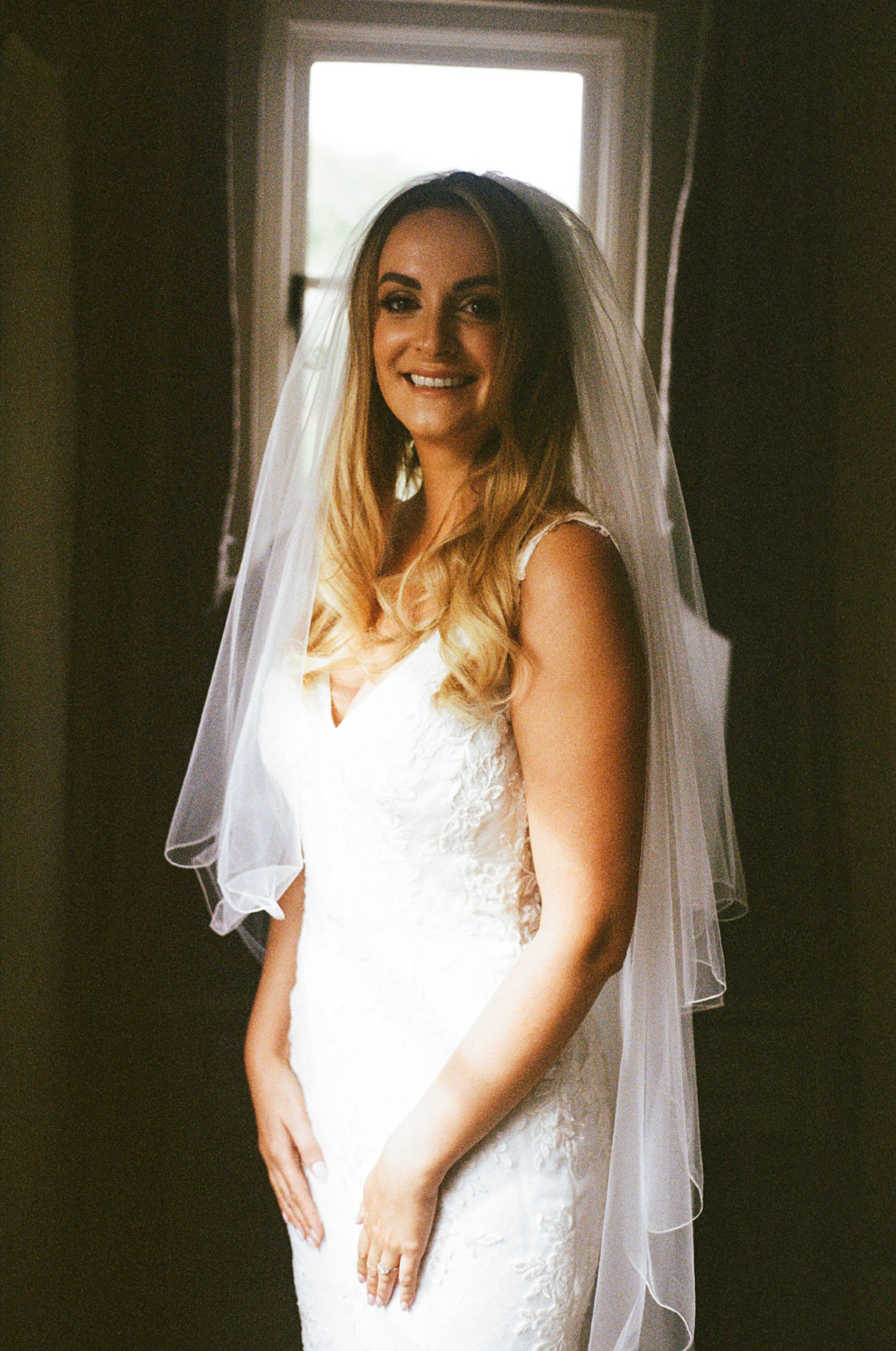 final moments before the wedding at Botley Hill Barn captured by film wedding photographer