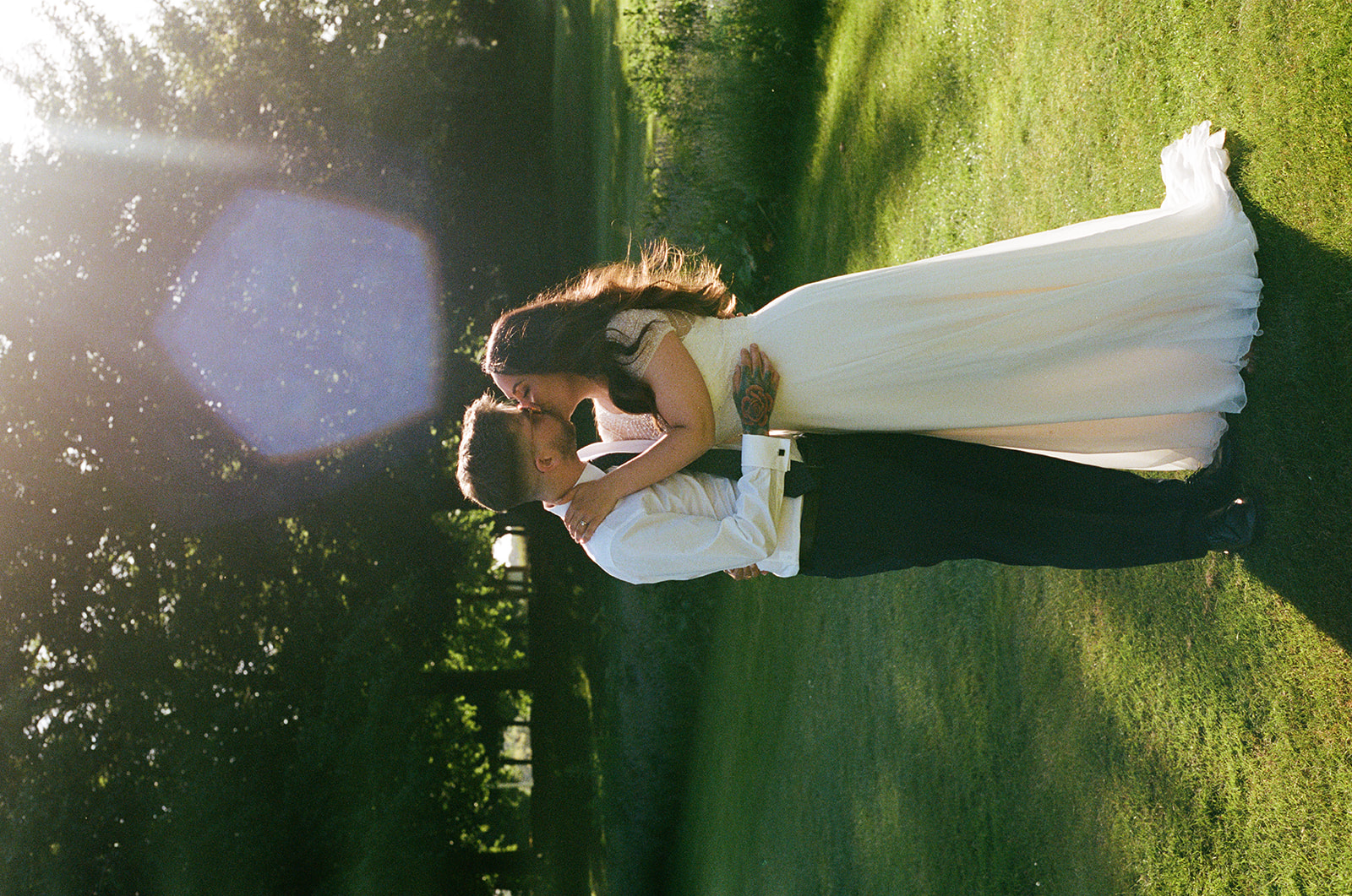 sunny wedding day portrait on 35mm film camera at Eastwell Manor