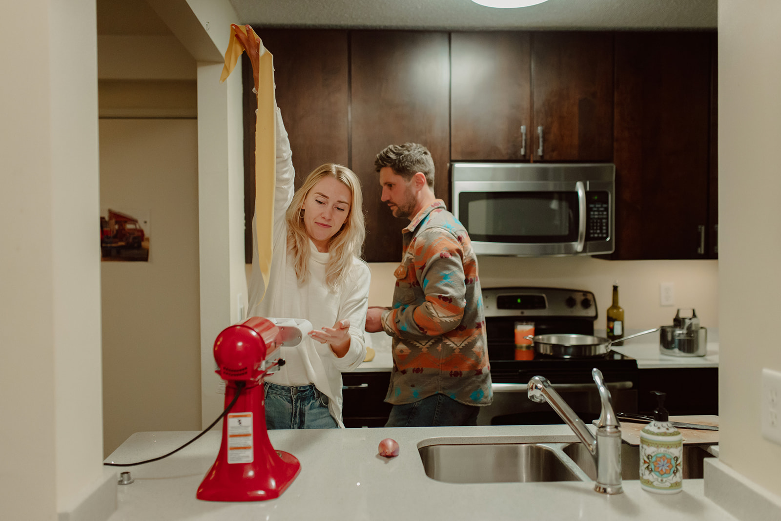 minneapolis documentary engagement photos cooking at home
