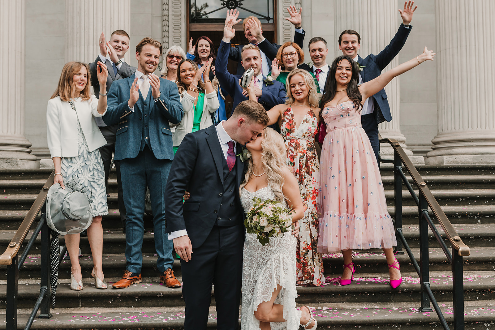couple and guests at the wedding ceremony on the steps of Olde Marylebone Town Hall