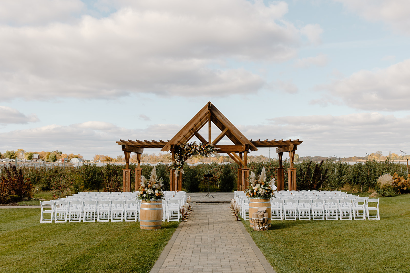 Ceremony site in front of an apple orchard