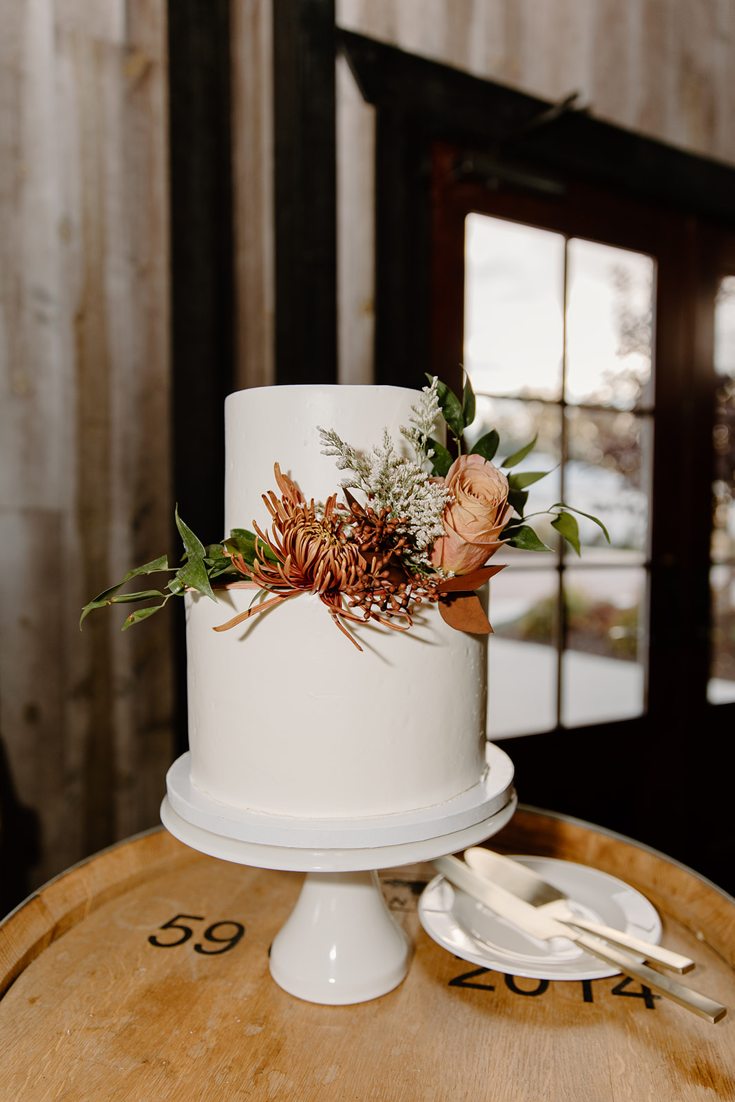 Two tier wedding cake with flowers