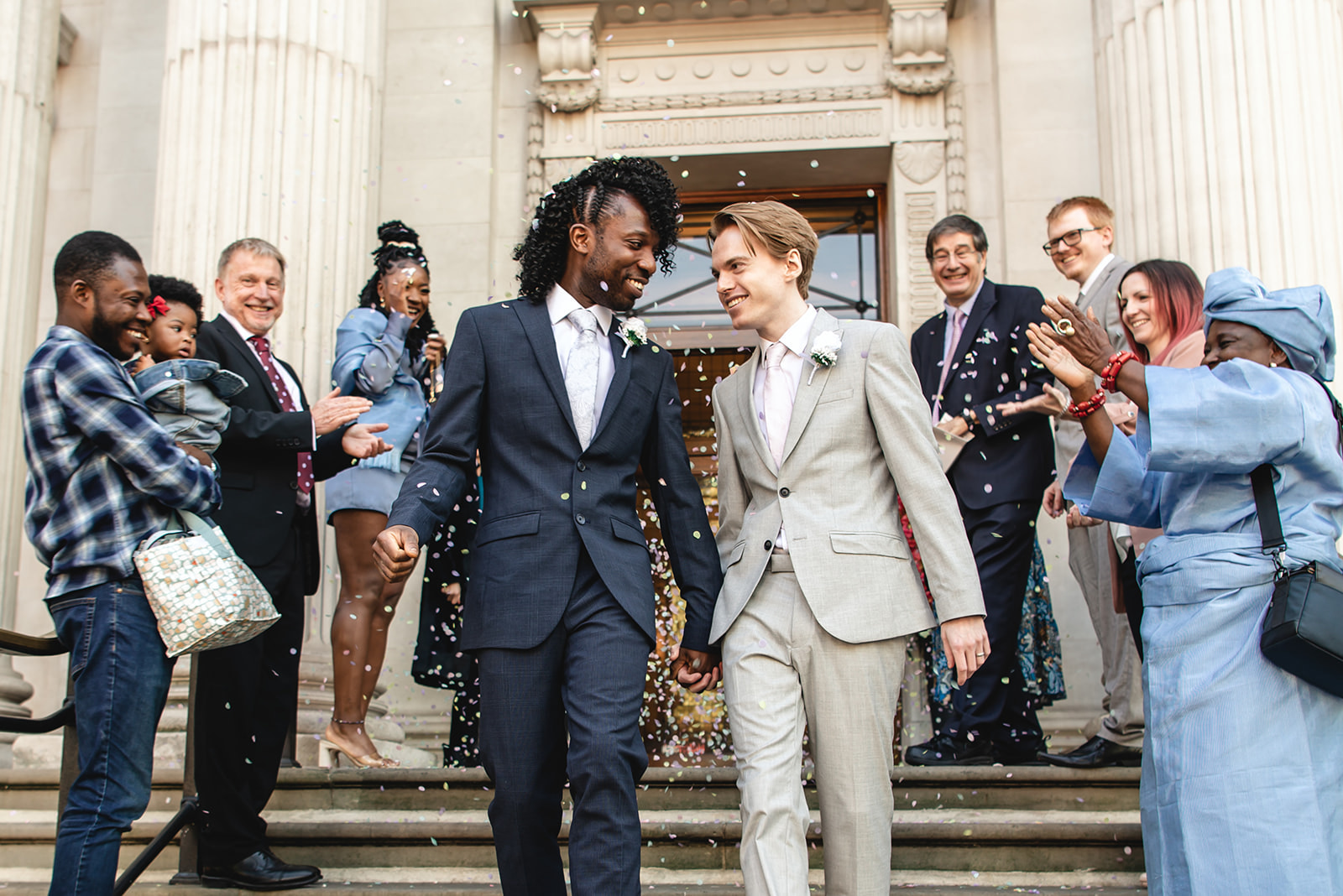 Benjamin and Ezekiel's candid portrait on the steps of Marylebone Town Hall