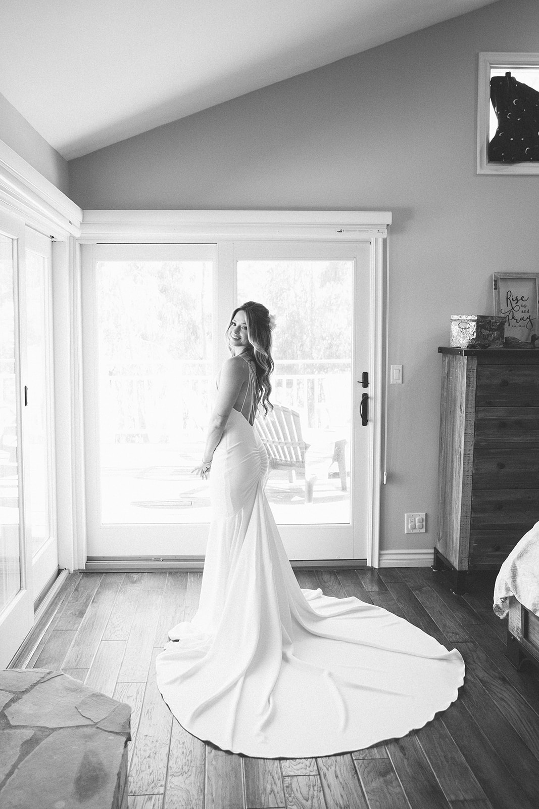 Stunning bridal gown with train and low back accentuated with a beautiful back chain in this bridal portrait. 