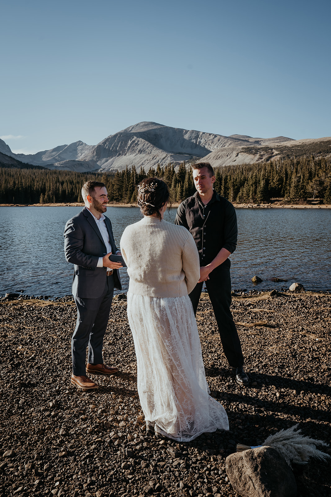 Lakeside elopement ceremony as couple gets married in Rocky Mountains, Colorado 