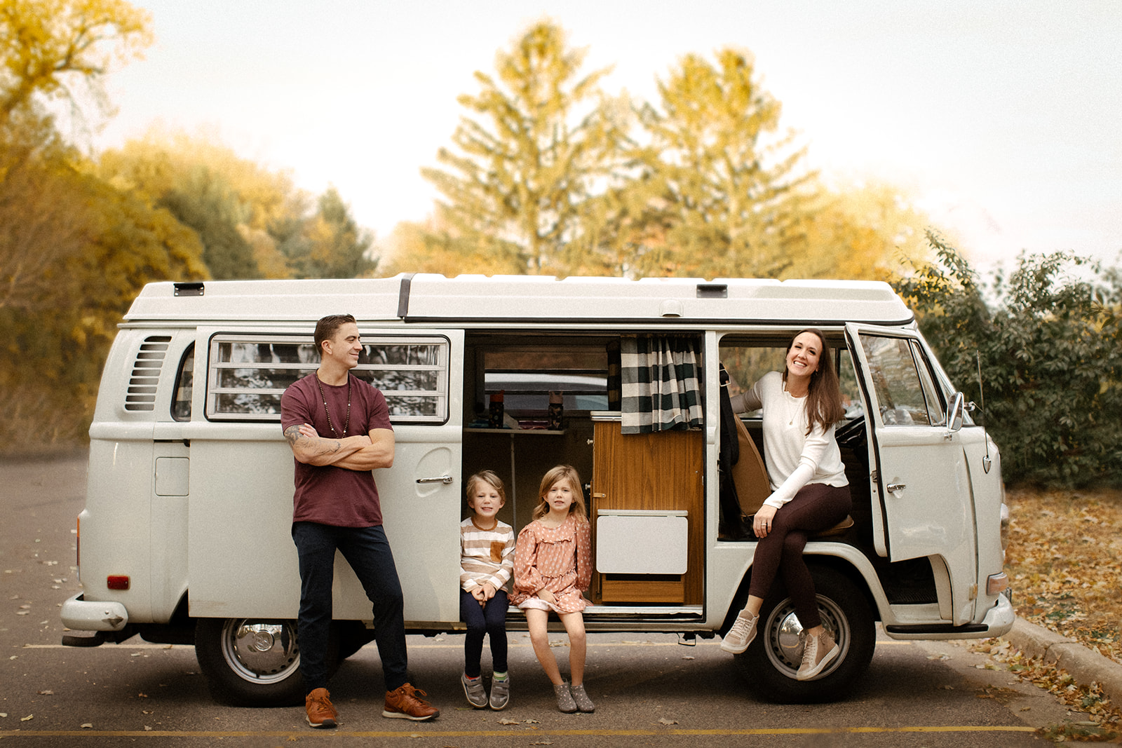 A family stands in front of their vw bus for a minneapolis mini session