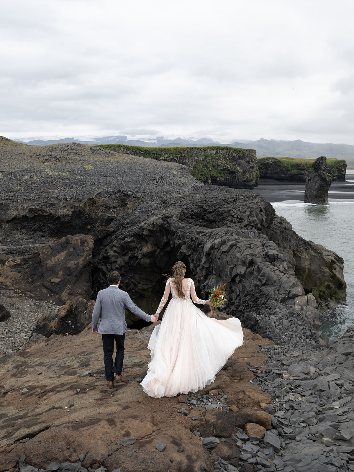 Bride and groom exploring Iceland during their Elopement